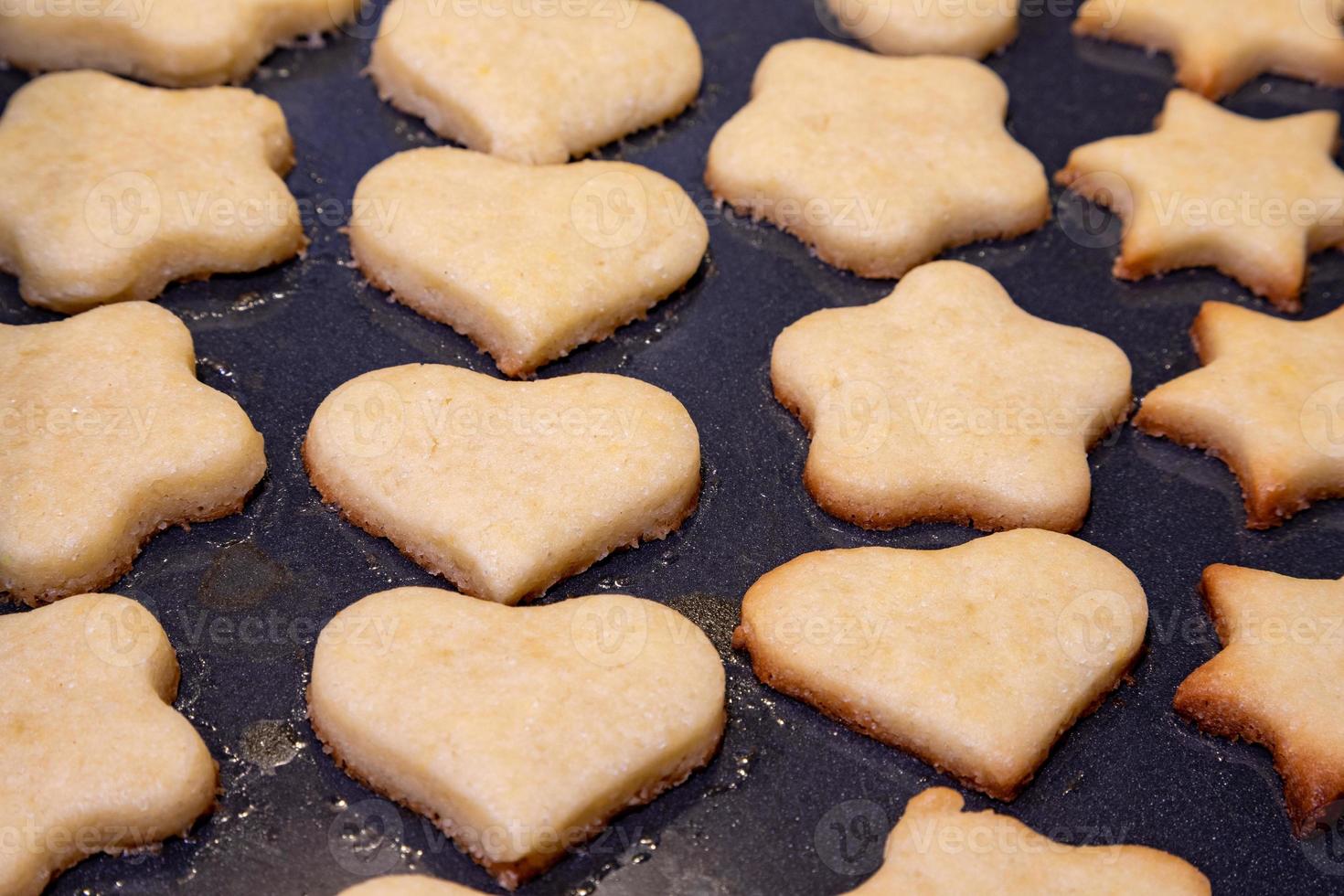 Freshly roasted cookies in the tray. Close up photo