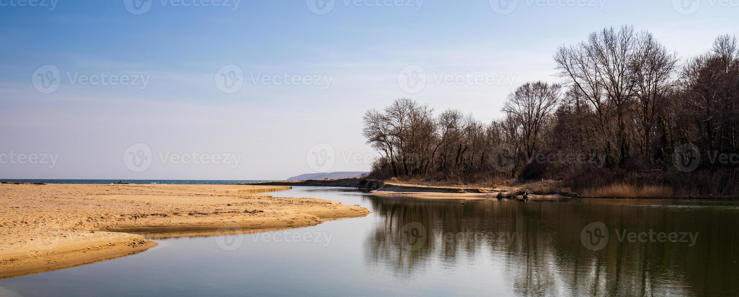 Panoramic view of large estuary of the Kamchia River, flowing into the Black Sea, Bulgaria photo