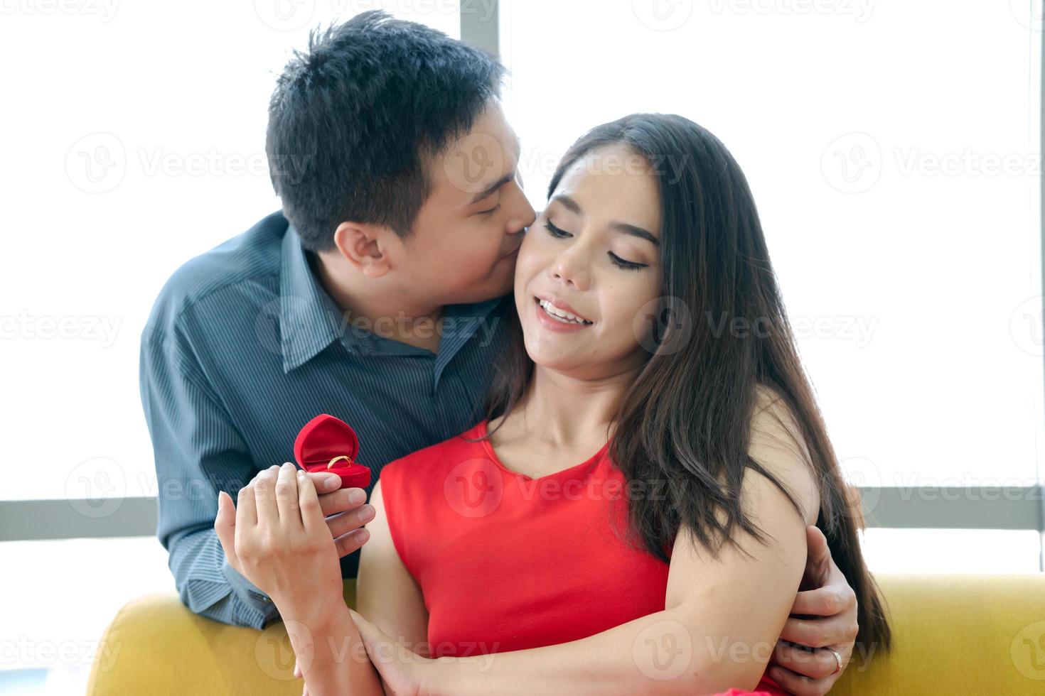 Romantic concept with man making marriage proposal photo
