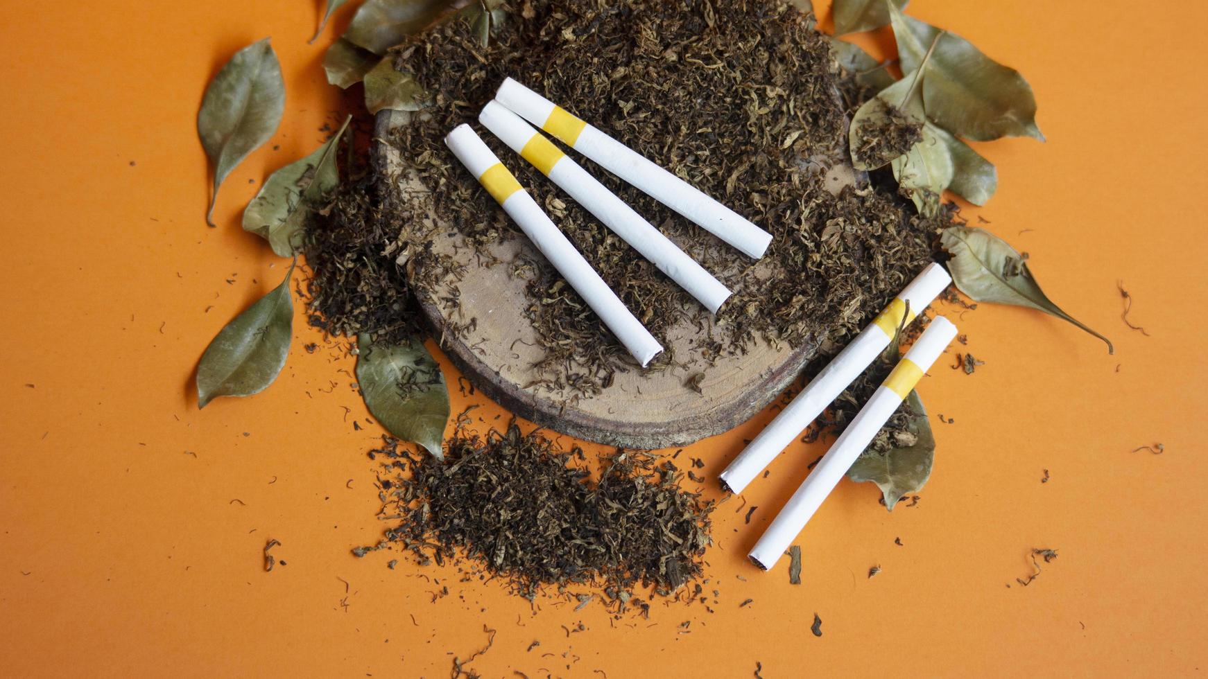 View of tobbacco heap and cigarette use photo
