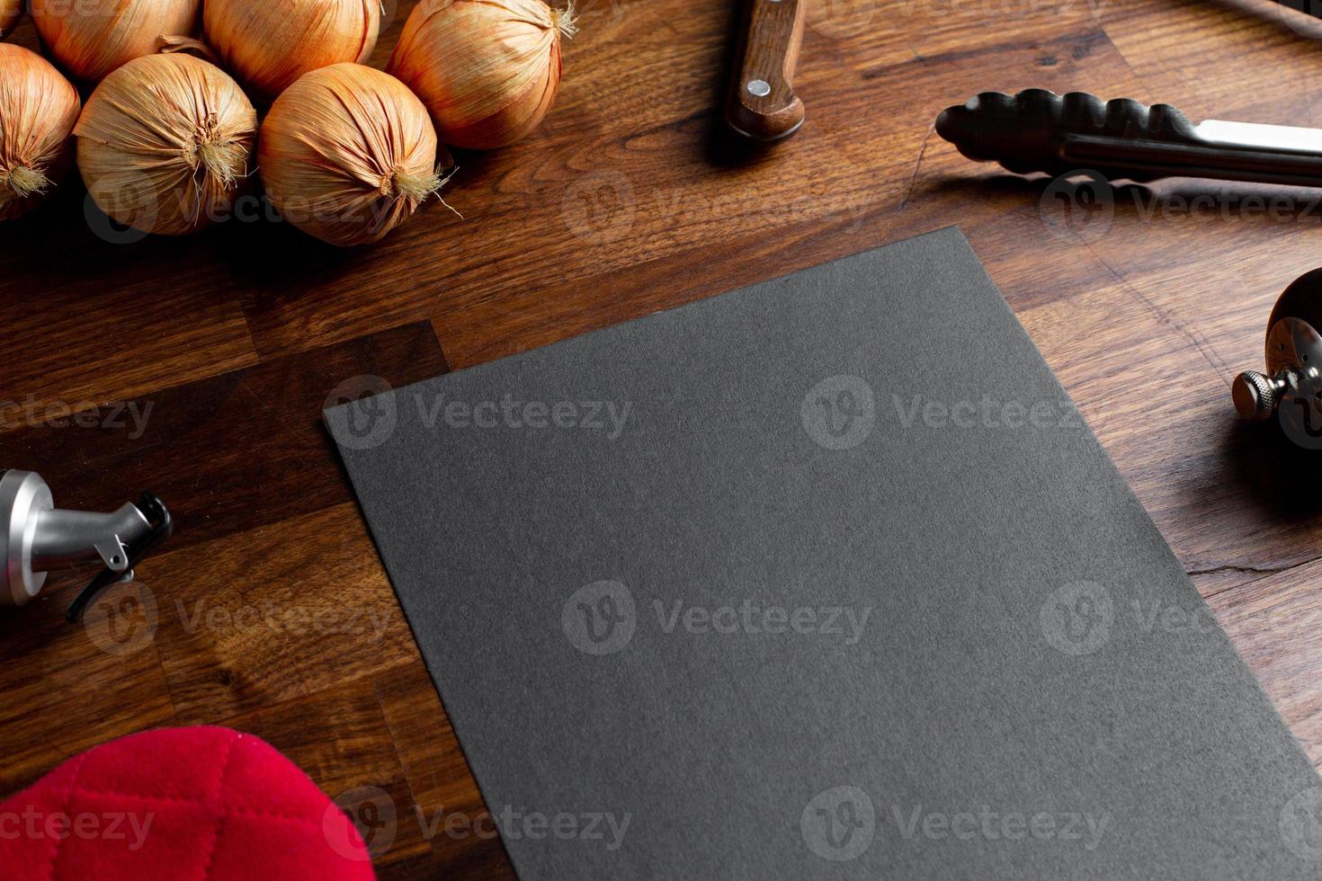 Hipster cafe menu empty mock up for concept design. Business concept. Template design. Information concept with kitchen objects on wooden table photo
