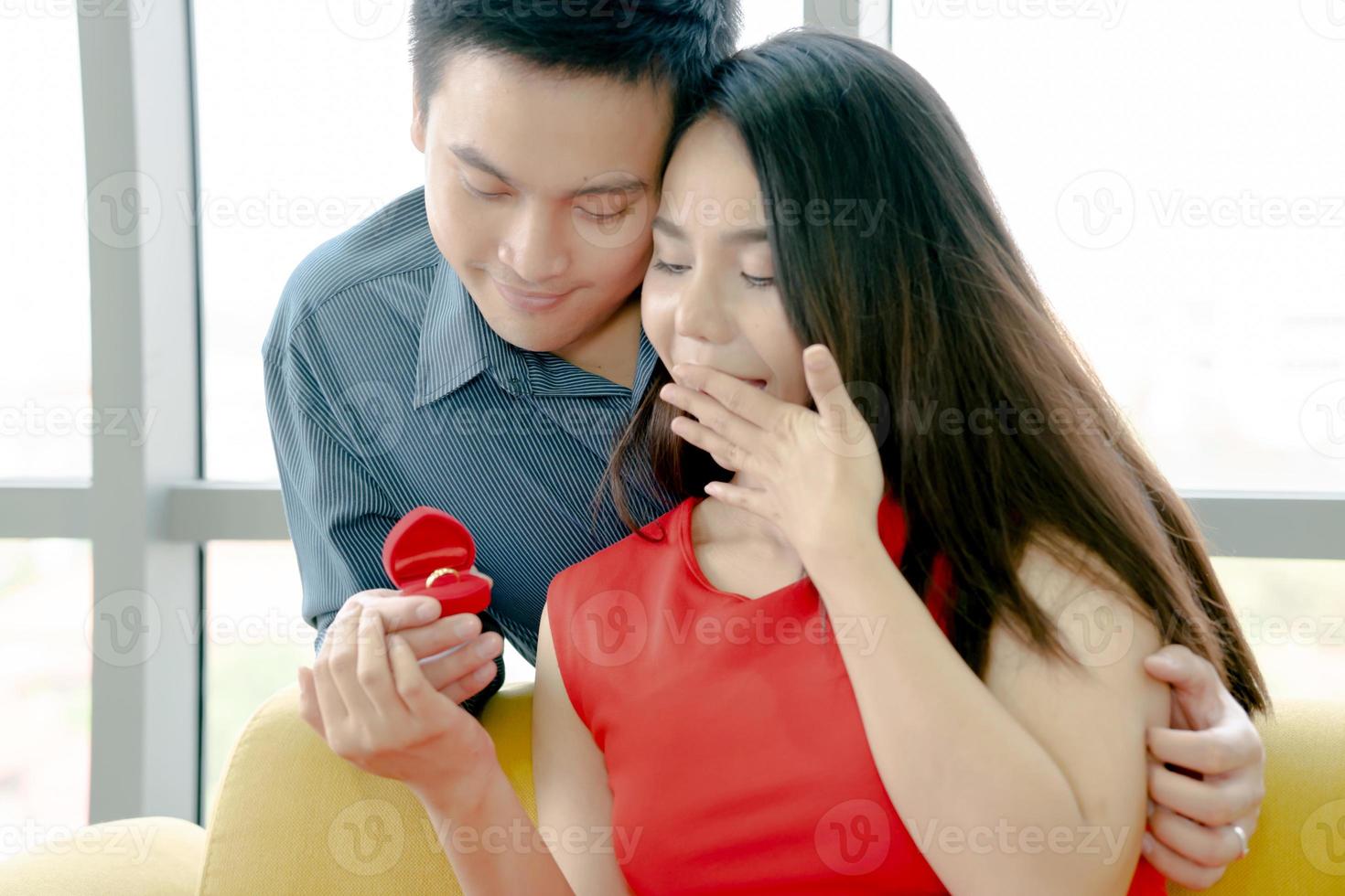 Romantic concept with man making marriage proposal photo