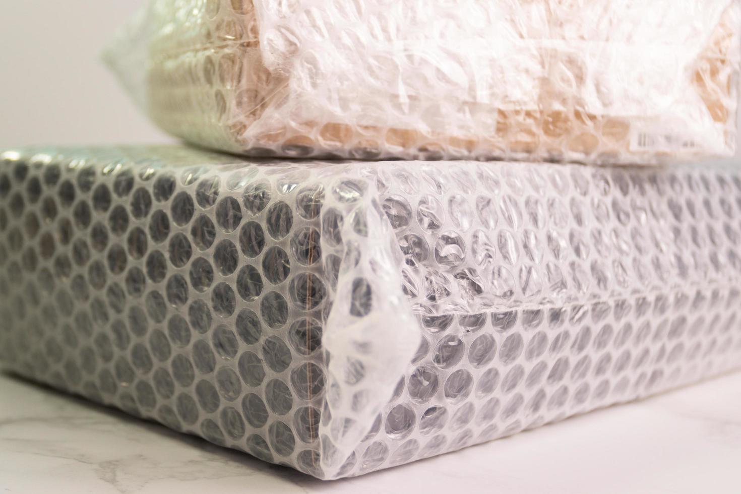 Bubbles covering the box by bubble wrap for protection product cracked  or insurance During transit photo