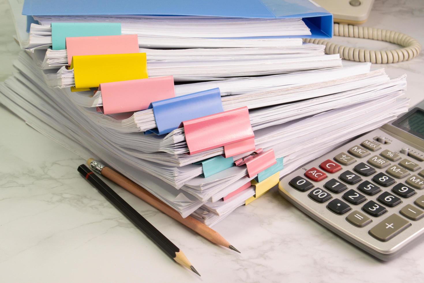 document paper of business report paper file on the table with pencil and calculator, concept document in work office photo