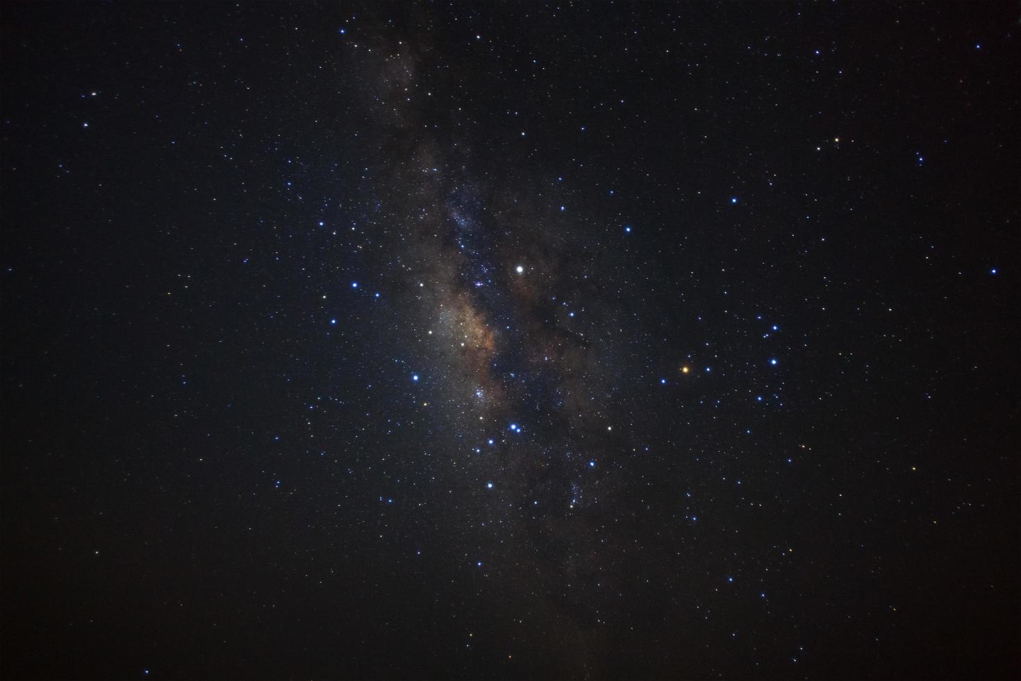 Milky way galaxy with stars at Phu Hin Rong Kla National Park,Phitsanulok Thailand, Long exposure photograph.with grain photo