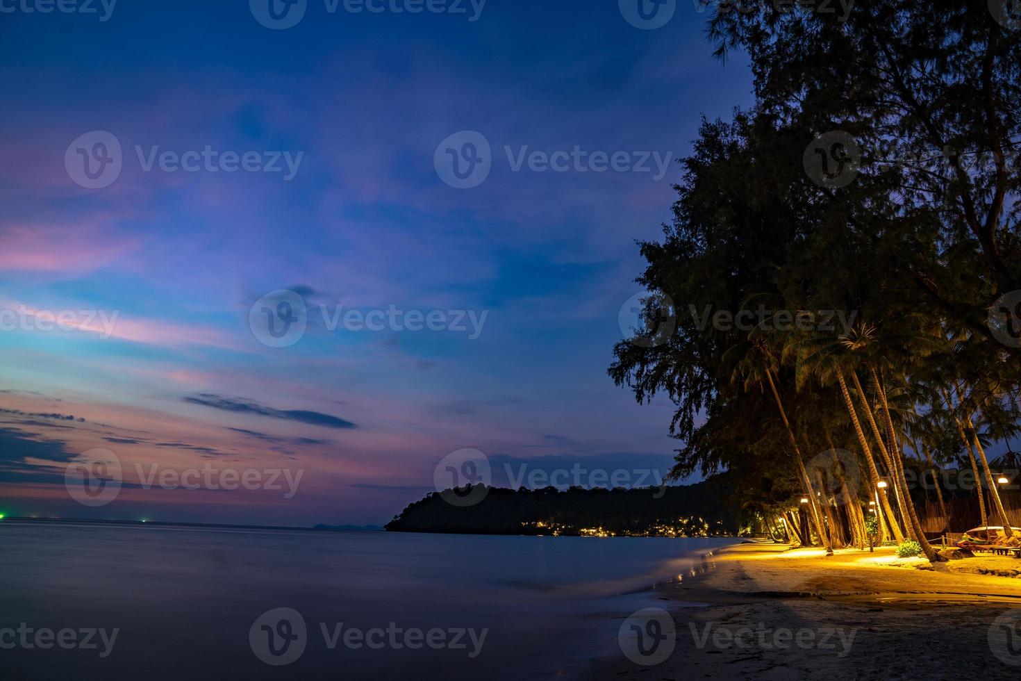 Purple violet sky at the beach and sea, in Twilight Time, Koh Kood, Trad province, Thailand. photo