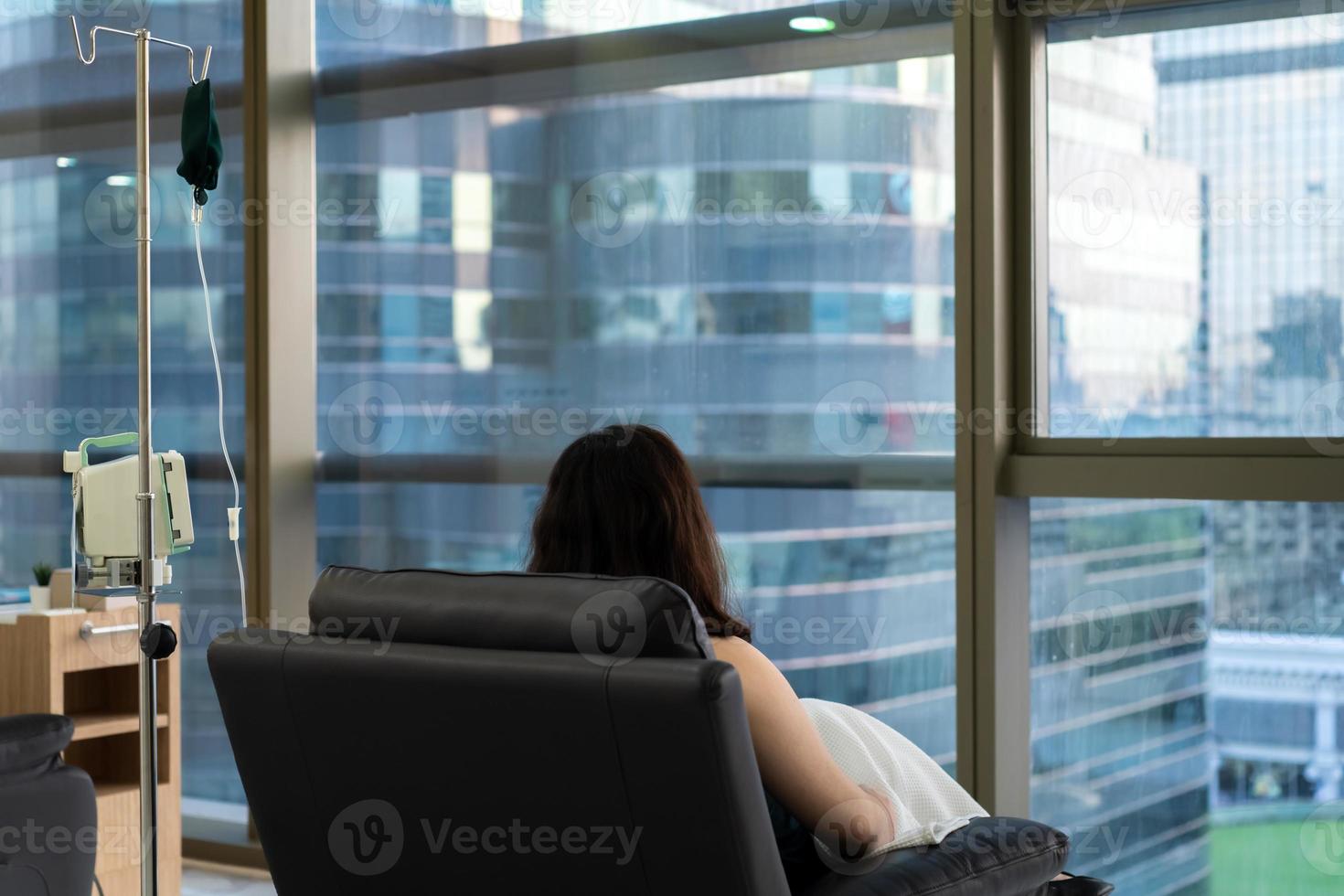 Luxury room which can see panoramic cityscape view. This room is fot customer or patient who sit at sofa between wait the saline solution processing. photo
