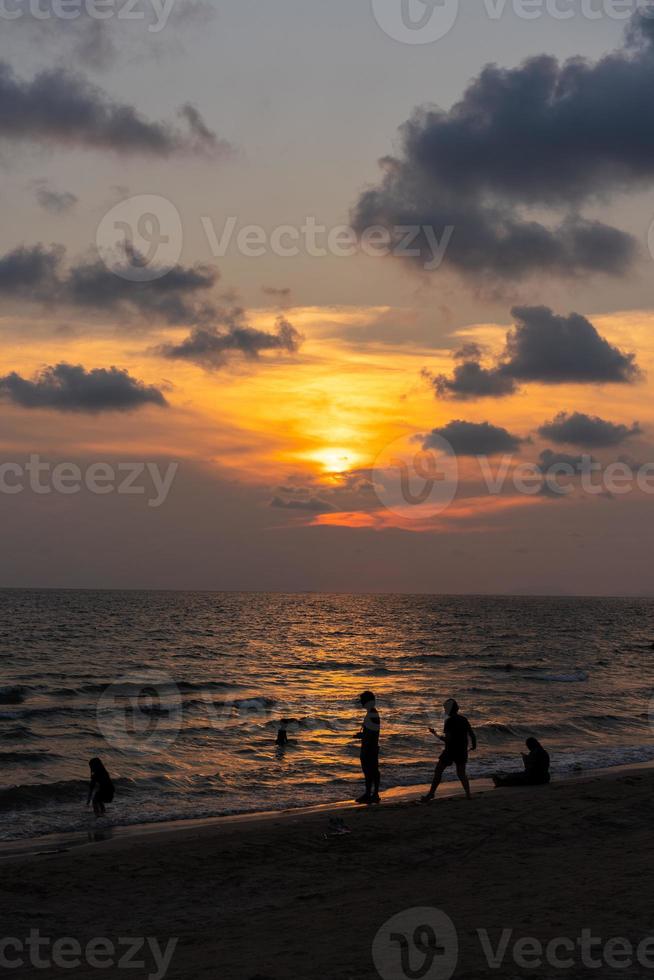 Classic beautiful Twilight romantic and amazing sunset moment at the Chantaburi beach - East of Thailand. photo