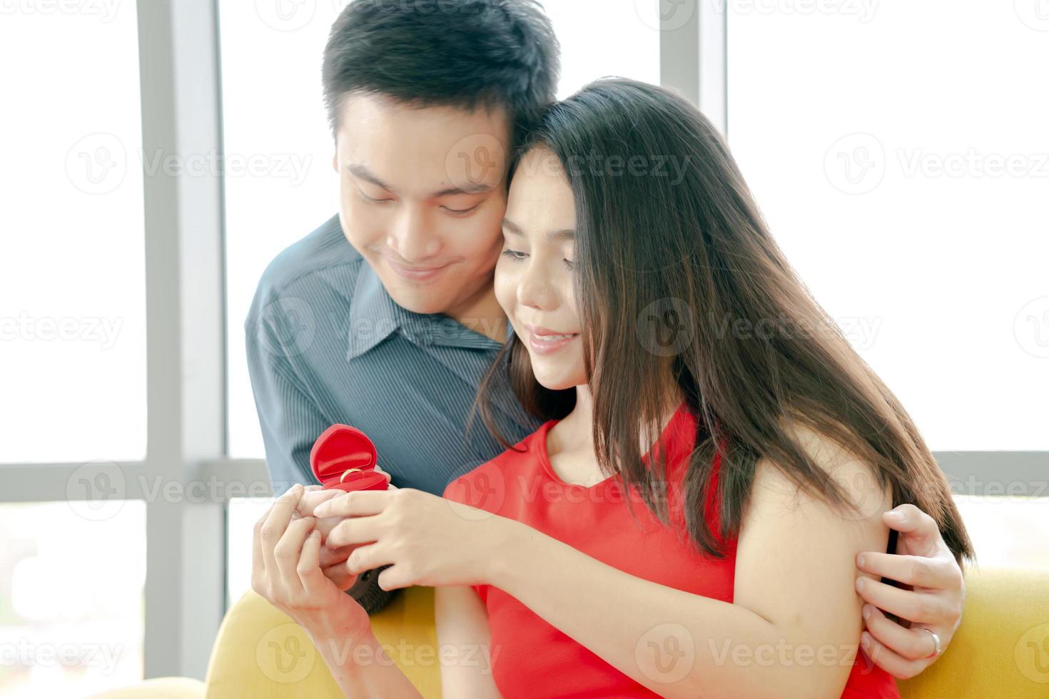 Romantic concept with man making marriage proposal photo