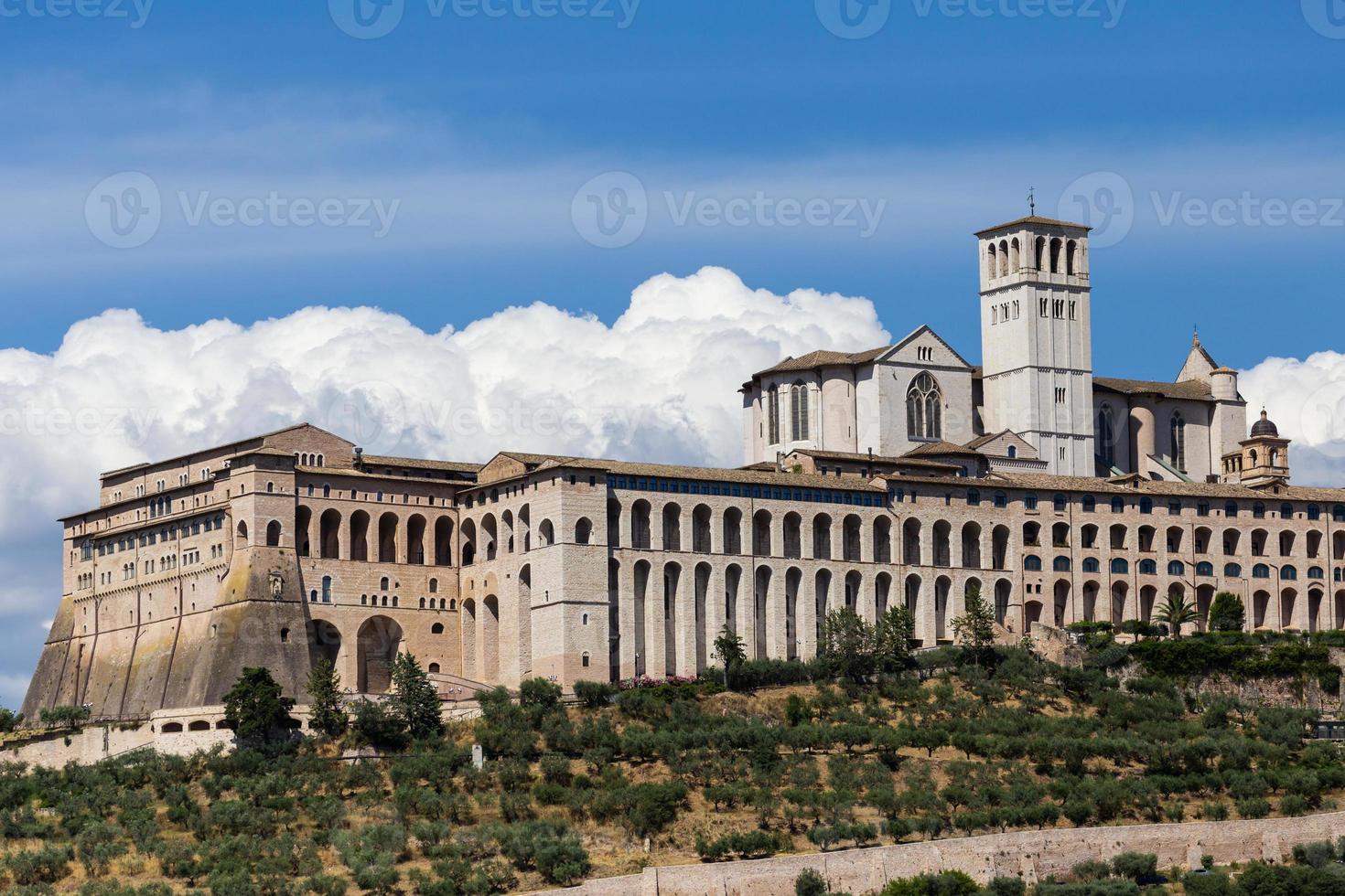 Assisi village in Umbria region, Italy. The most important Italian Basilica dedicated to St. Francis - San Francesco. photo