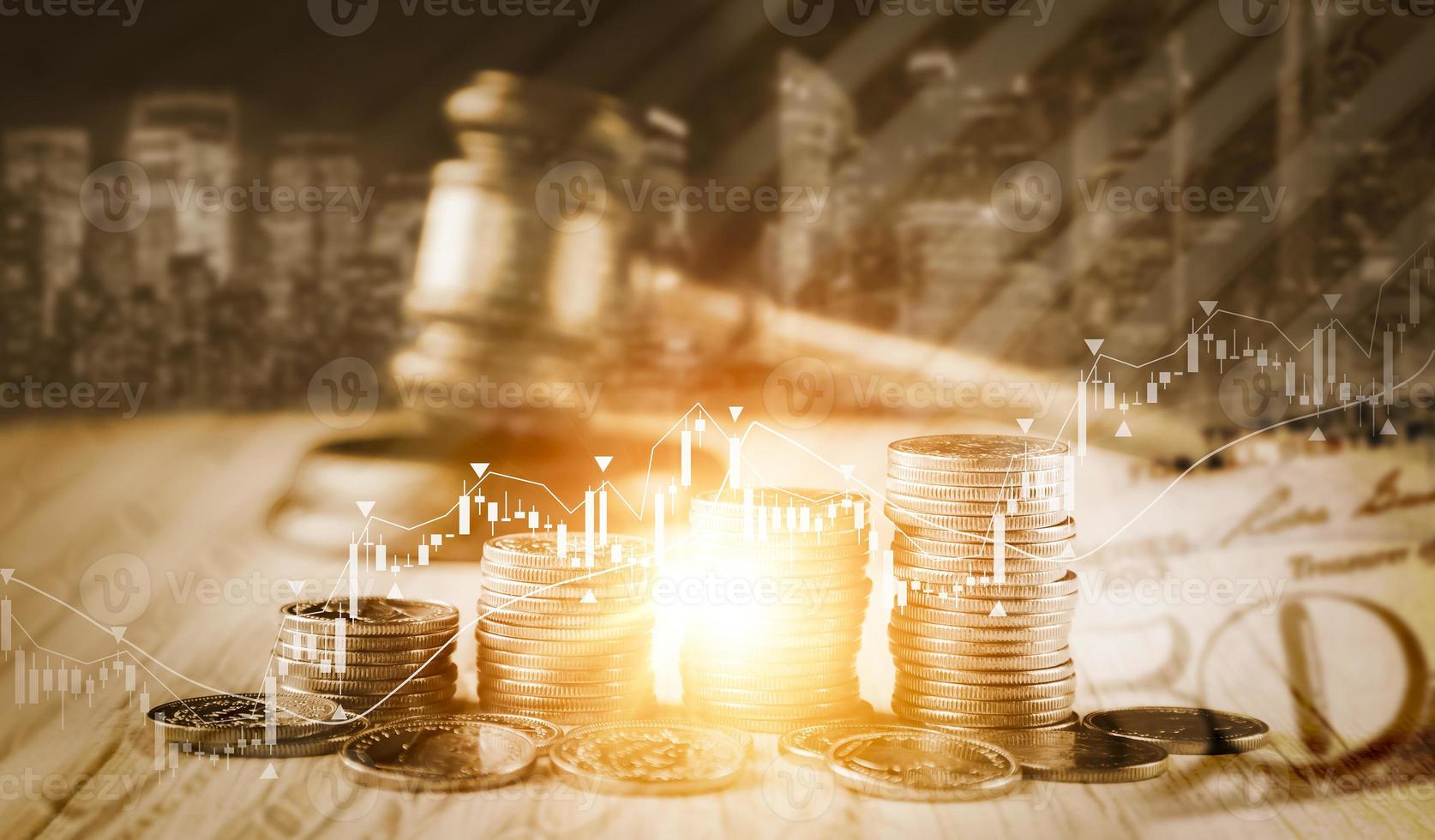 Spending planning and budget and Old wood Judge hammer background, stacking coins in close-up and coins stack the table wood background, Used for adjudication and Justice. save money concept photo