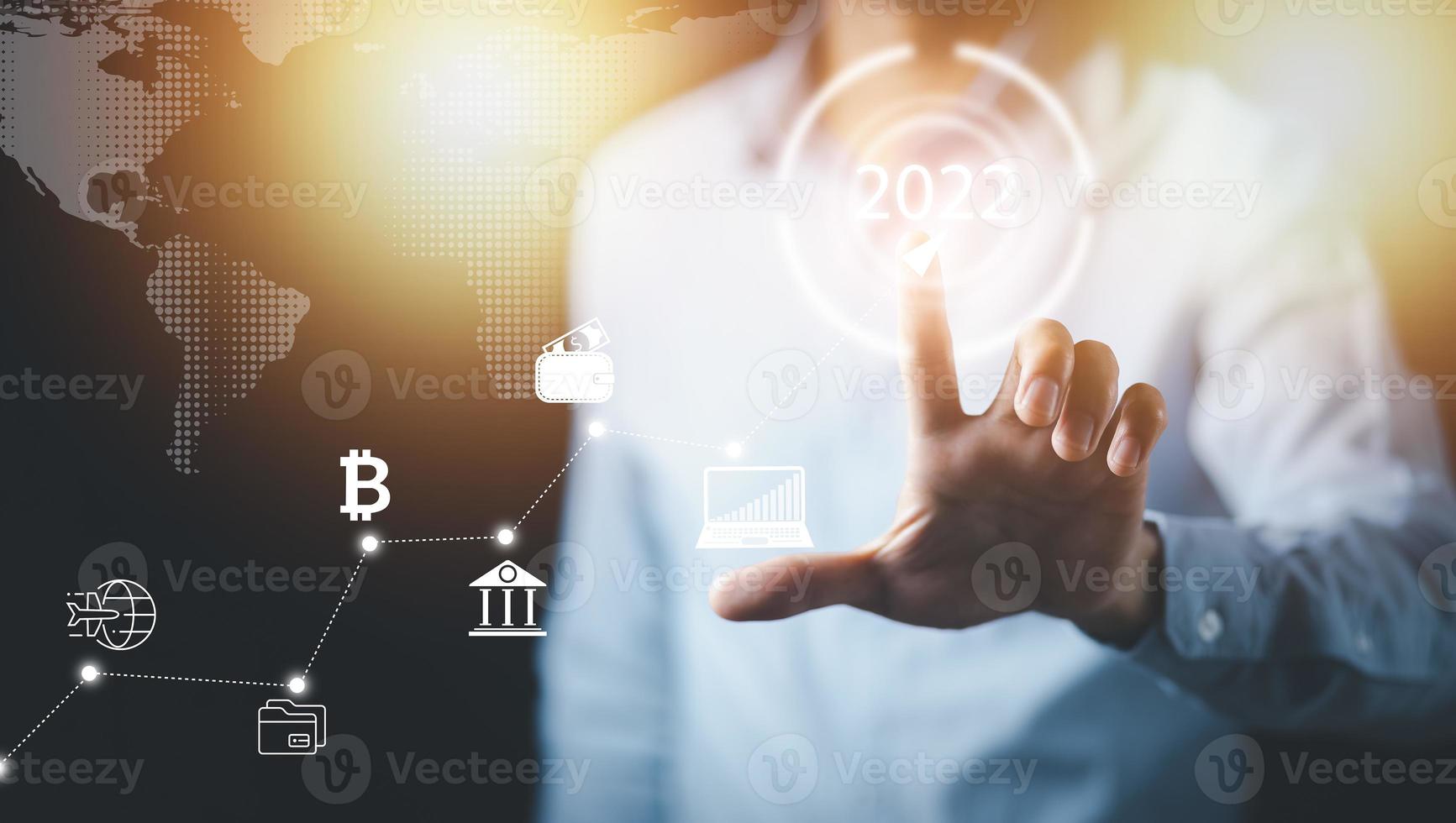 2022 and Startup concept with icon business and network connection on modern virtual interface from digital tablet.Businessman Touching tablet and graph Screen Icon of media screen, Technology Process photo