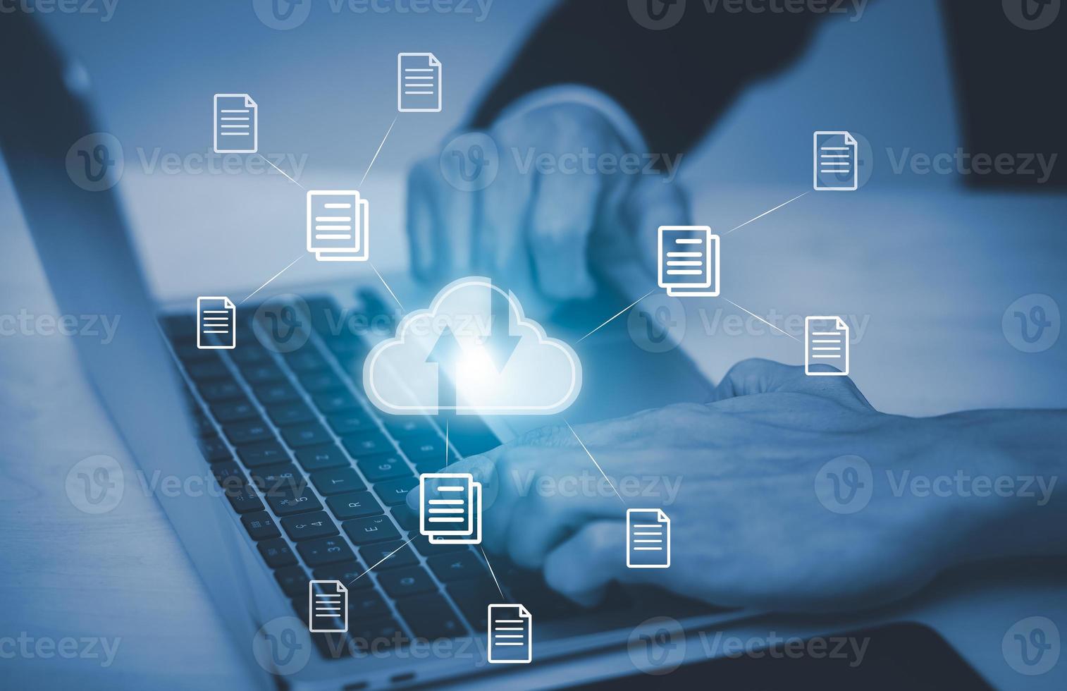 Hand using laptop with touch connect to data information on the Cloud Computing Technology Internet Storage Network Concept, big data internet technology, Cloud sharing download and upload. photo