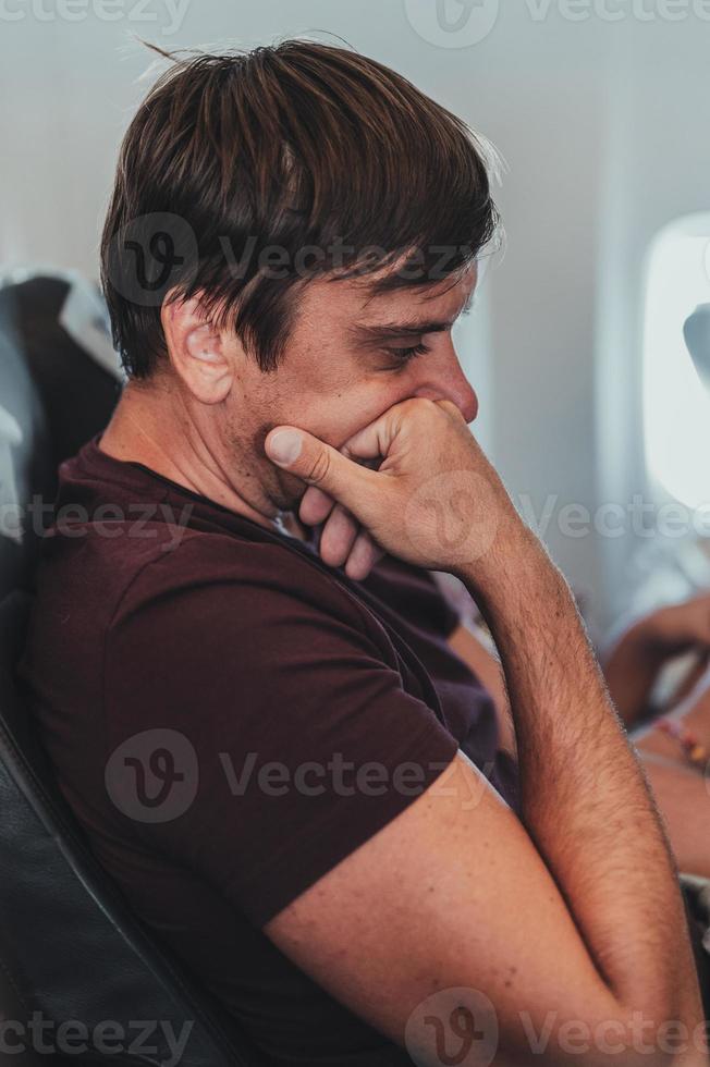 airplane man people pensive bored photo