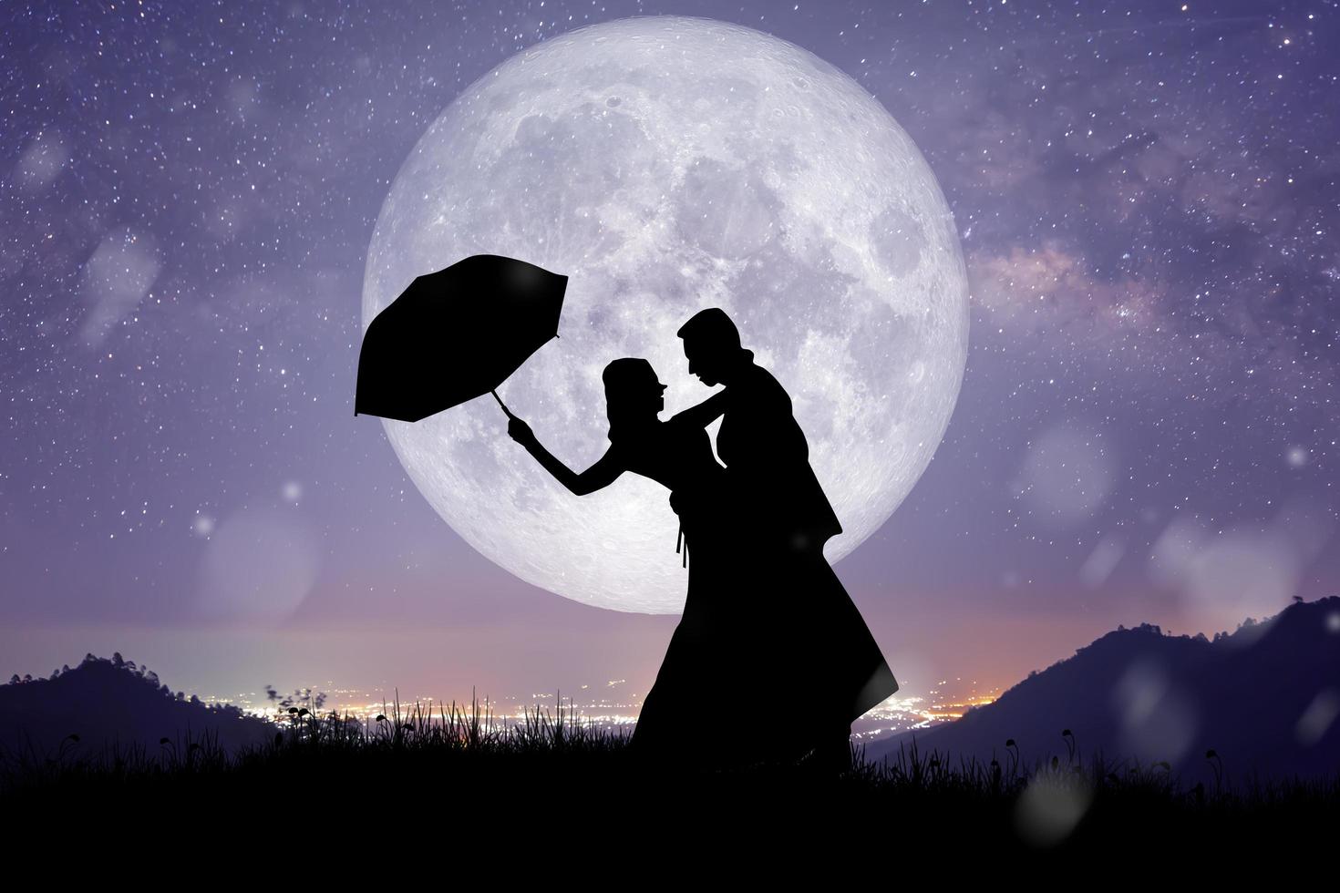 Silhouette of Couple, Lover, Relationship at night landscape. photo