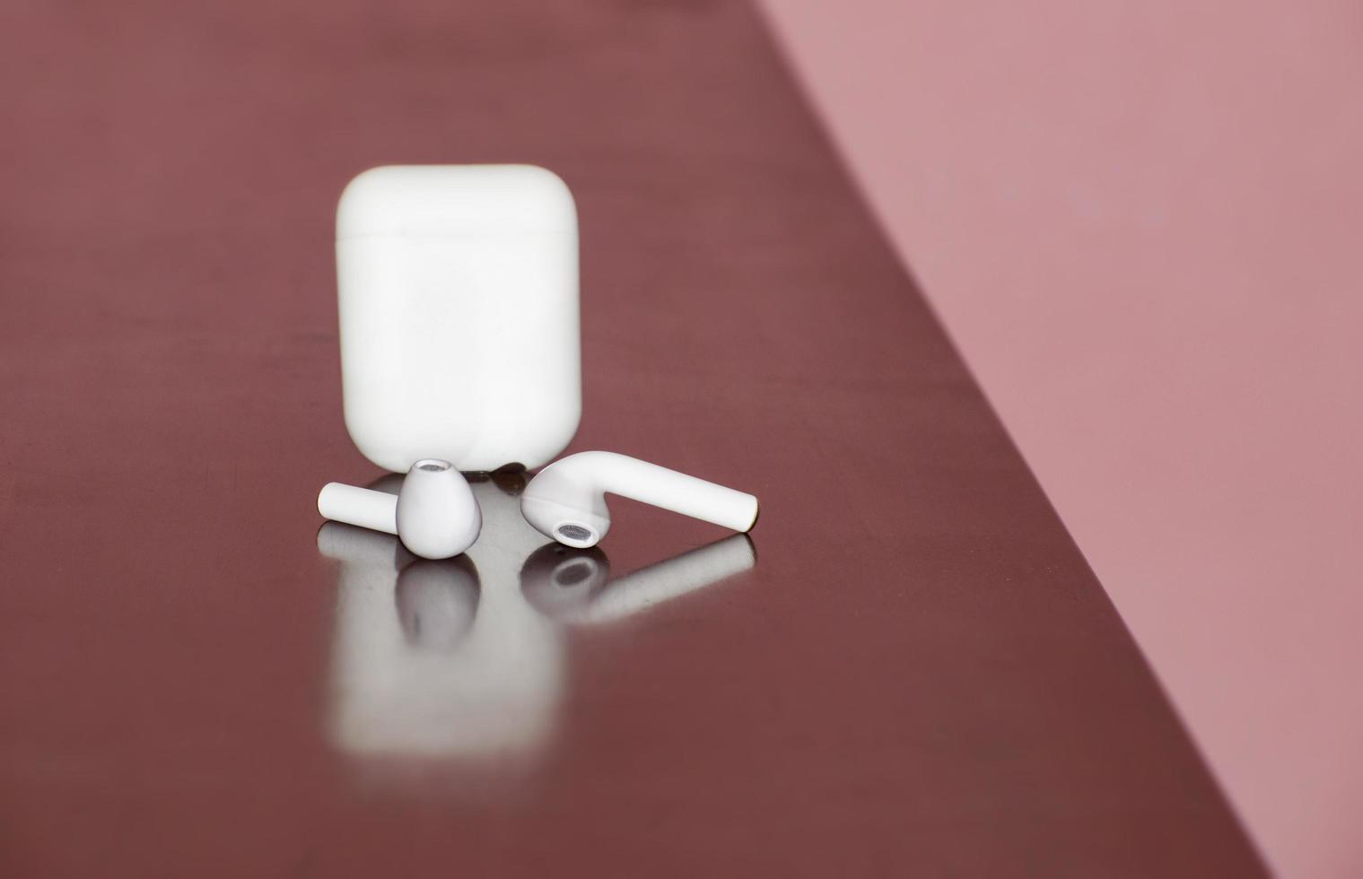 Isolated Air pod in dark background.White color Air Pod. photo