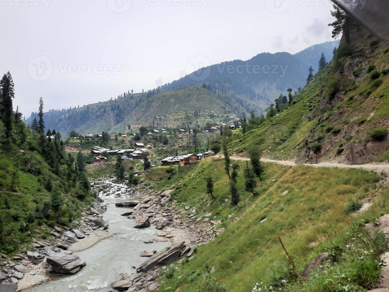 Kashmir is the most beautiful region in the world which is famous for its green valleys, beautiful trees, high mountains and flowing springs. photo