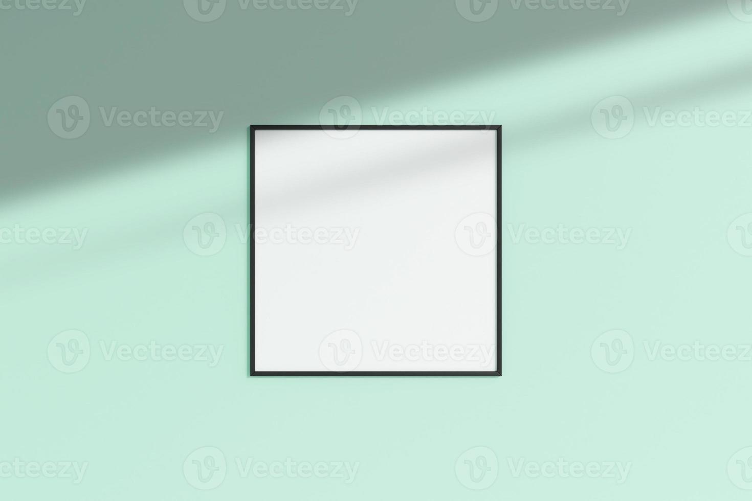 Realistic black square photo frame mockup hanging on empty wall room with shadow. 3d rendering.