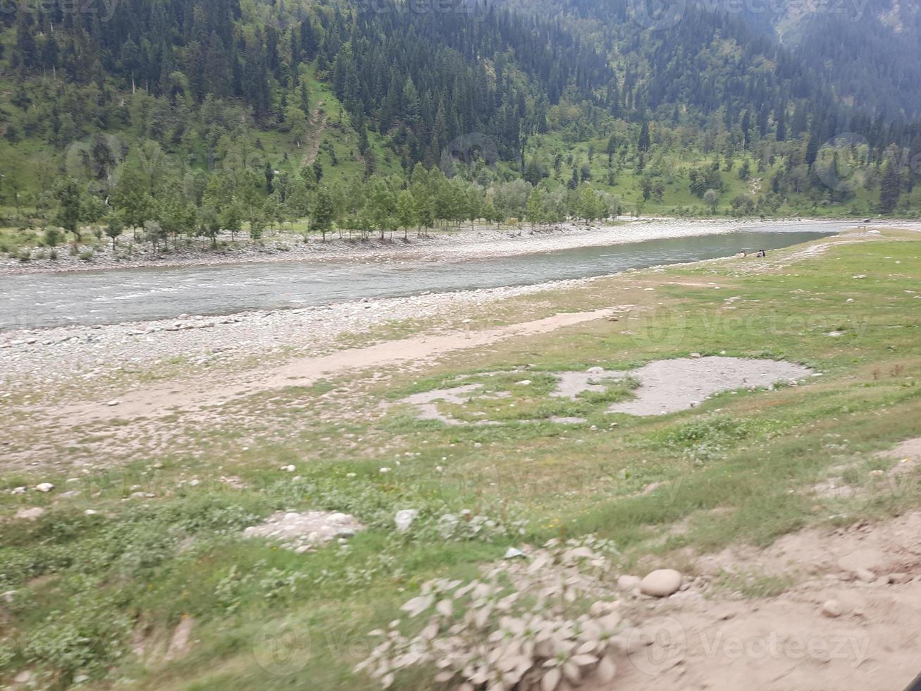 Kashmir is the most beautiful region in the world which is famous for its green valleys, beautiful trees, high mountains and flowing springs. photo