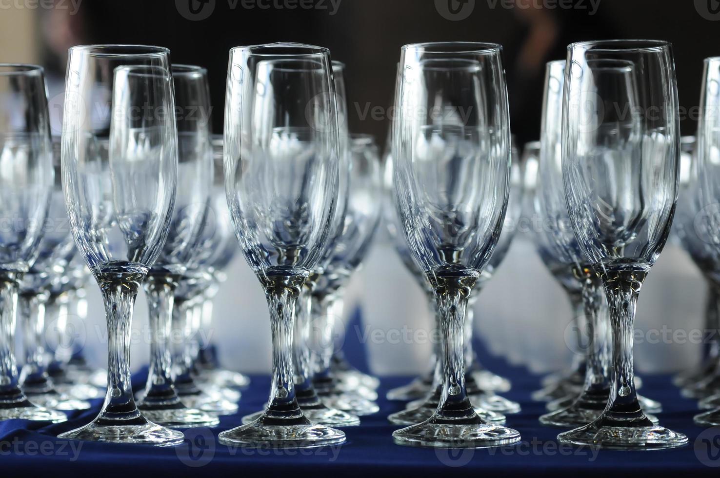 Stack of wine glasses in a party photo