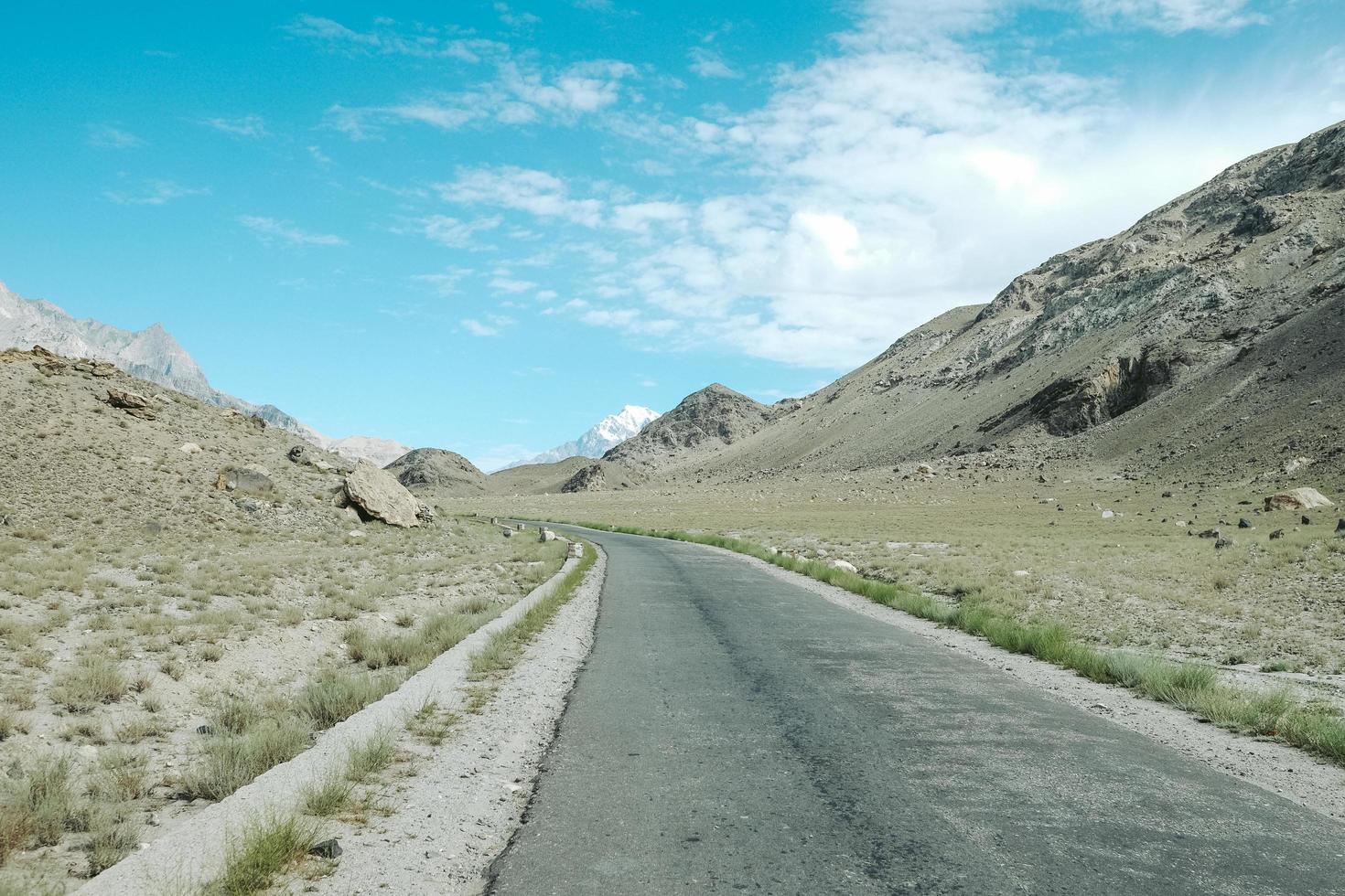 Long straight road  and blue sky photo