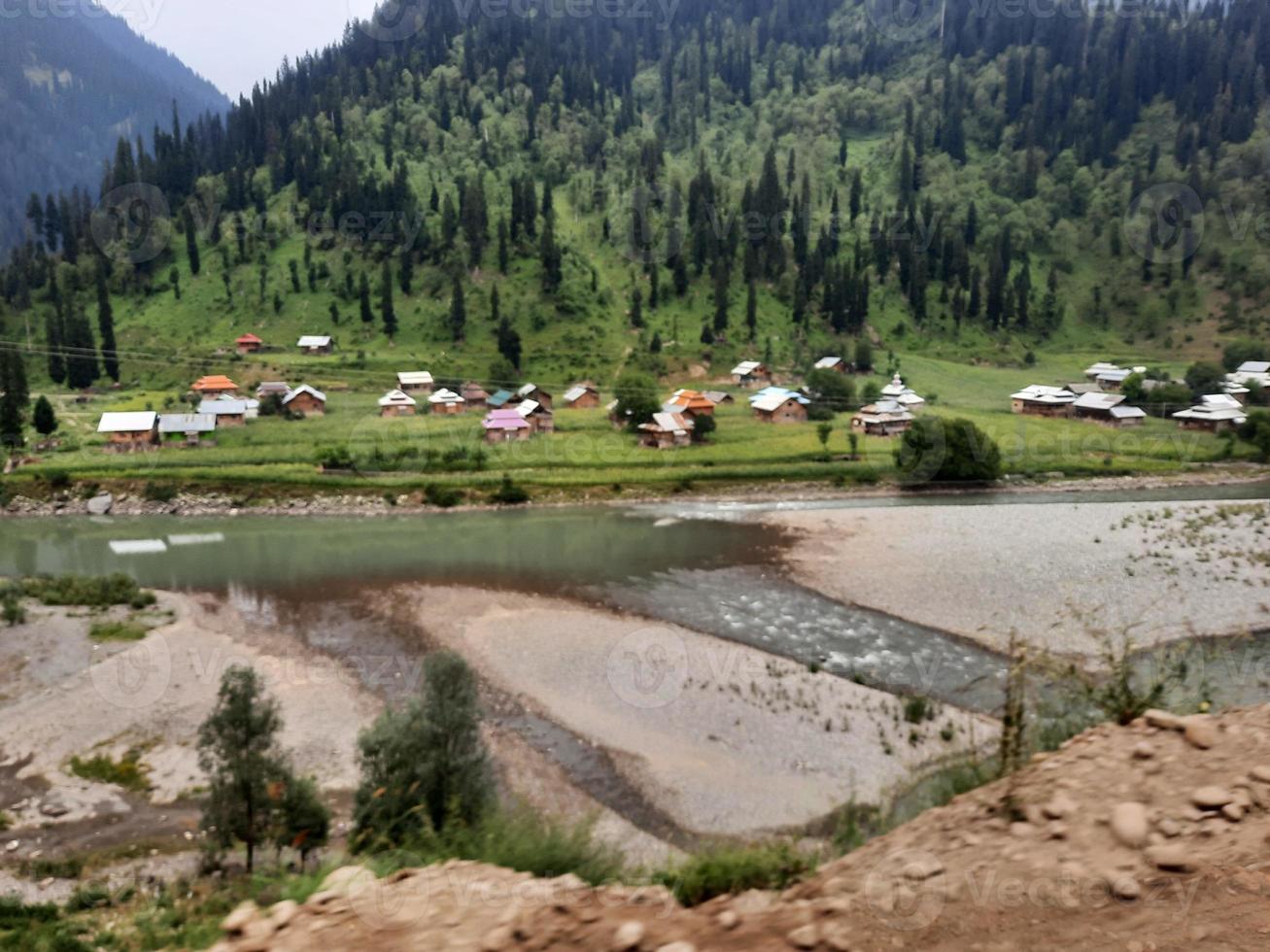 Kashmir is the most beautiful region in the world which is famous for its green valleys, beautiful trees, high mountains and flowing springs. photo