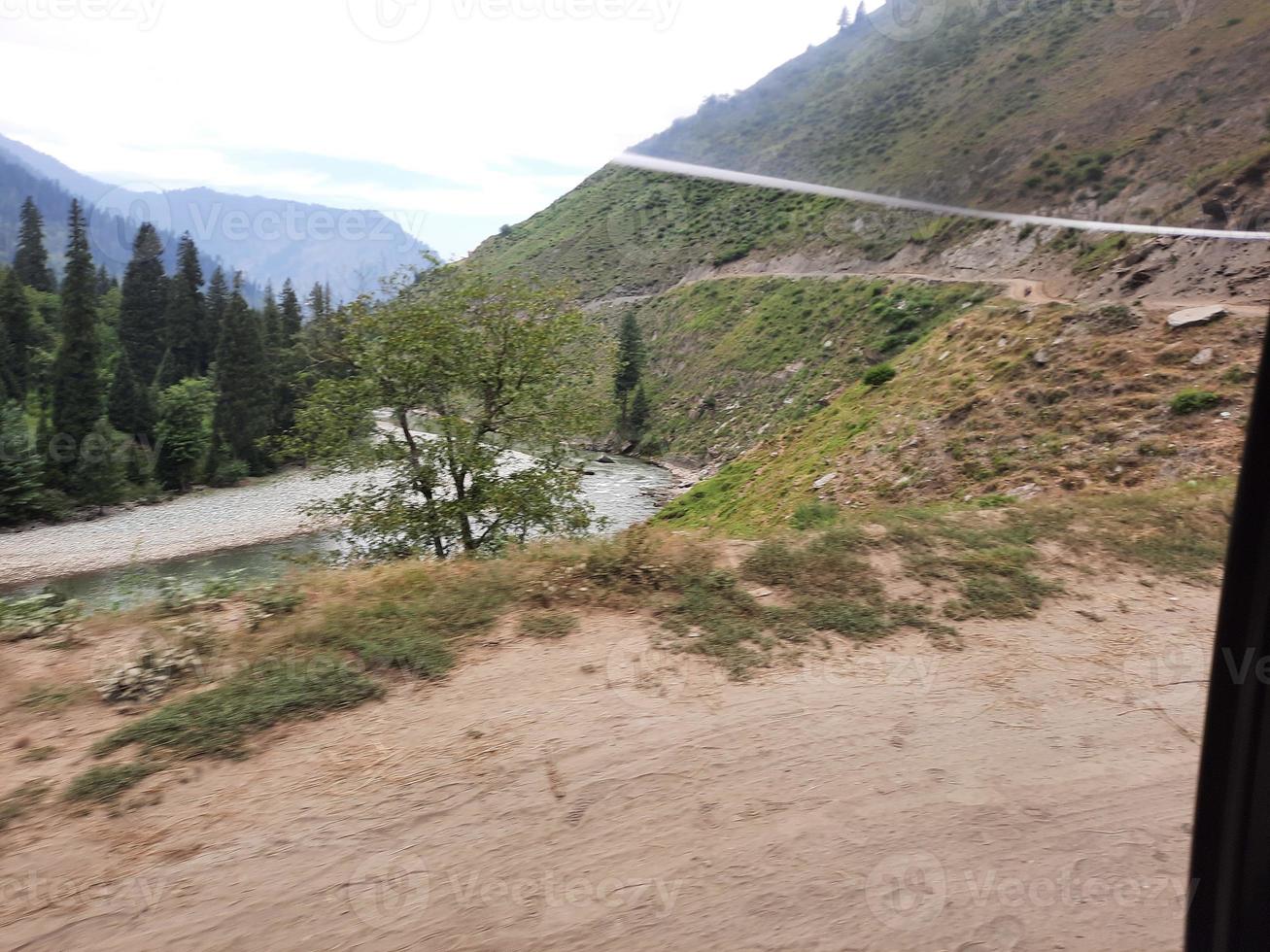 Kashmir is the most beautiful region in the world which is famous for its green valleys, beautiful trees, high mountains and flowing springs. photo