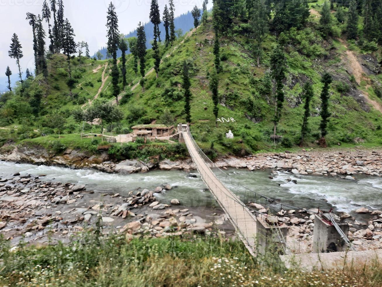 Kashmir is the most beautiful region in the world which is famous for its green valleys, beautiful trees, high mountains and flowing springs. photo