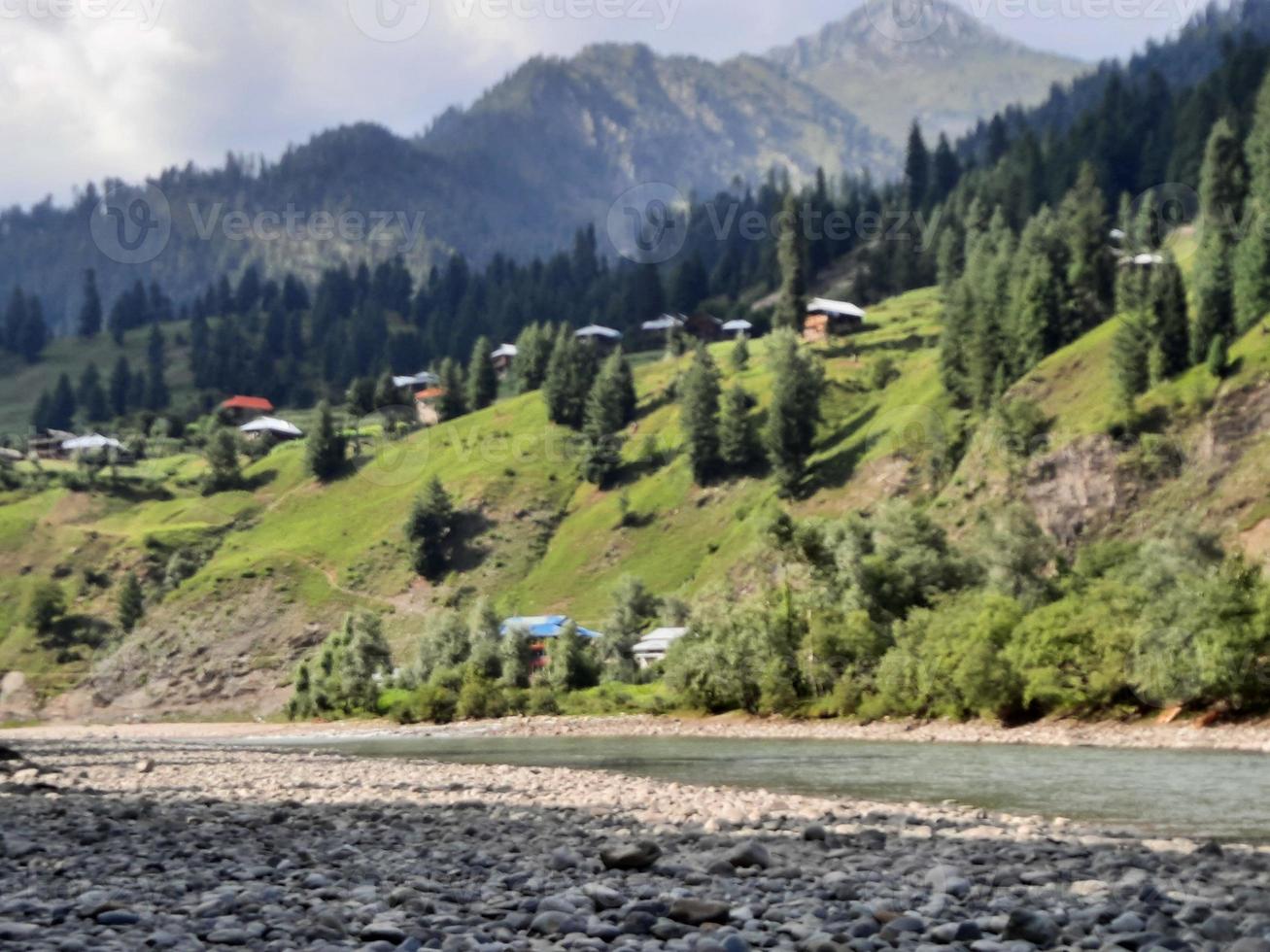 Kashmir is the most beautiful region in the world which is famous for its green valleys, beautiful trees, high mountains and flowing springs. photo