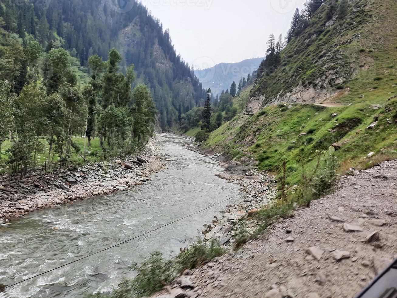 Kashmir is the most beautiful region in the world which is famous for its green valleys, beautiful trees, high mountains and flowing springs. photo