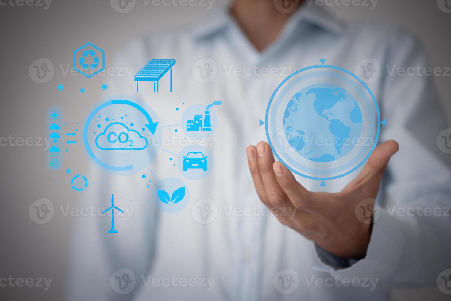 Technology, hand holding with environment Icons over the Network connection. Environmental technology concept. photo