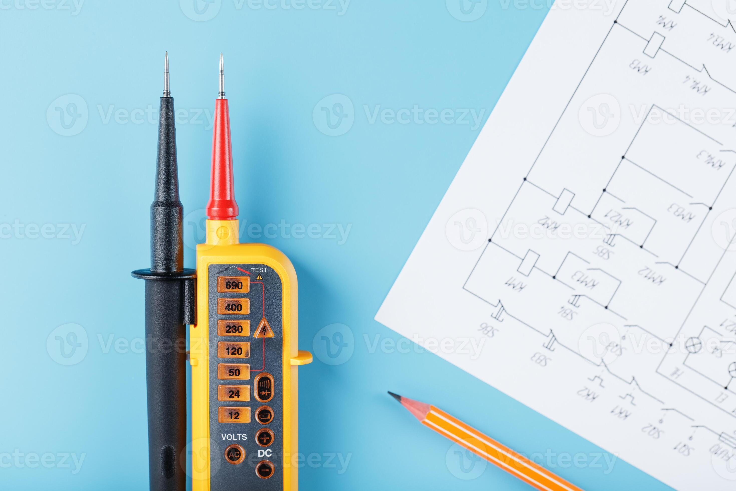 Yellow voltage indicator with an electrical diagram on a blue