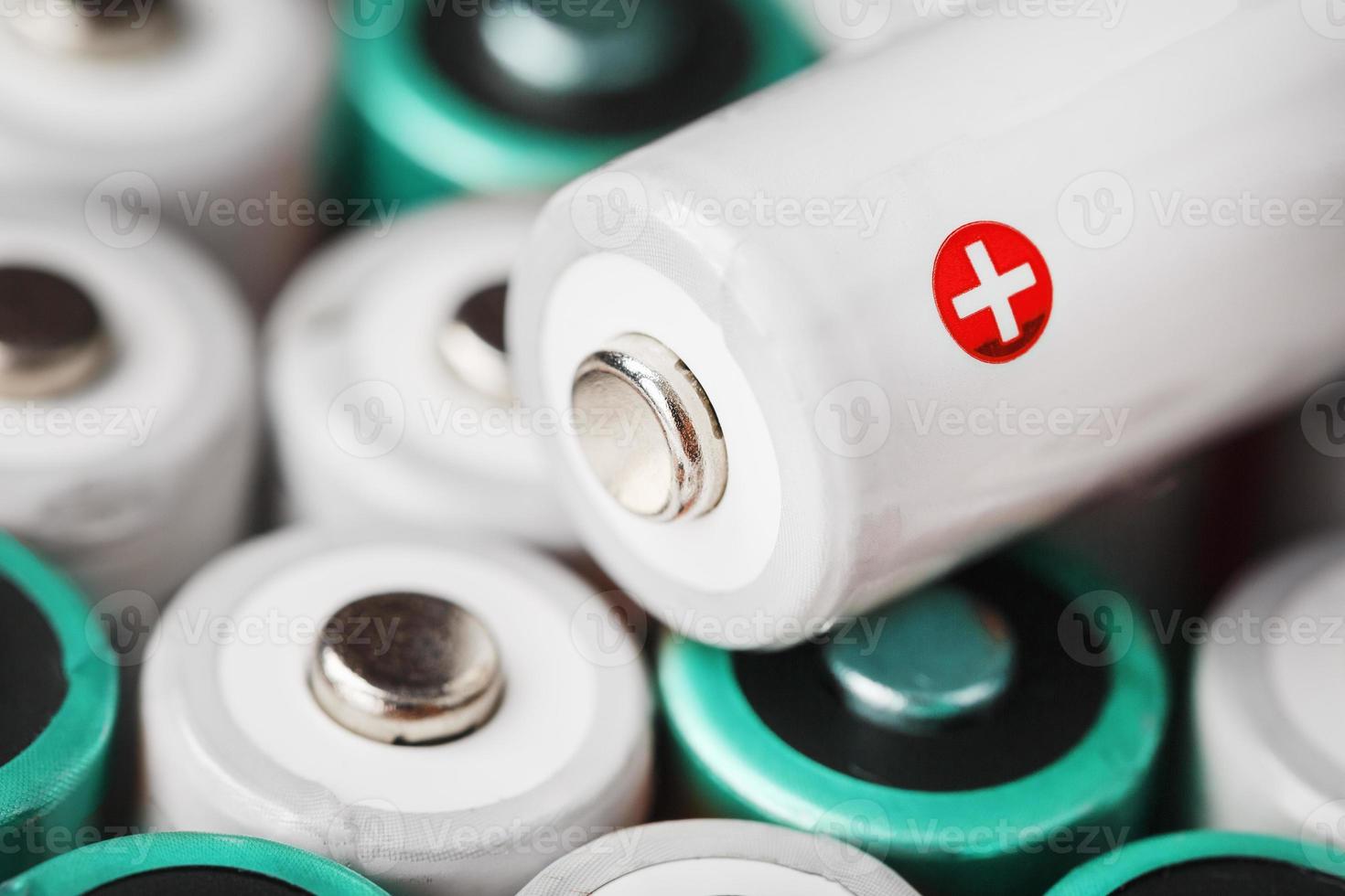 AA rechargeable batteries with a white battery with a positive polarity photo