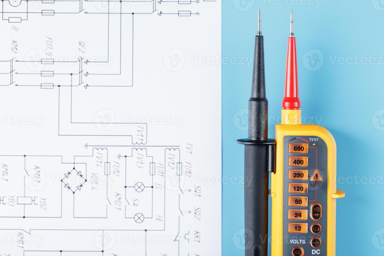 Yellow voltage indicator with an electrical diagram on a blue