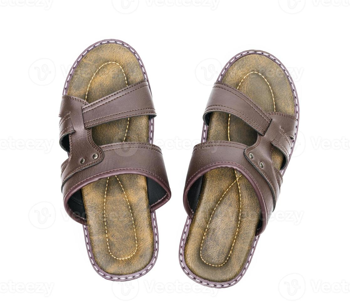 Brown leather slippers isolated on white background,top view photo