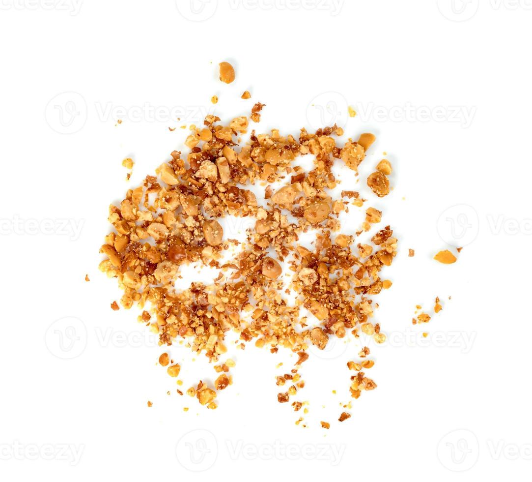 Fried ground peanuts isolated on white background photo