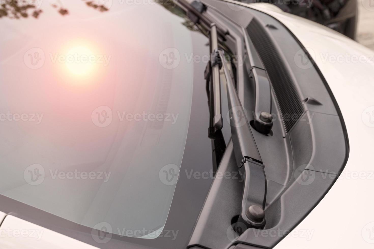 close up wipers of a white car photo