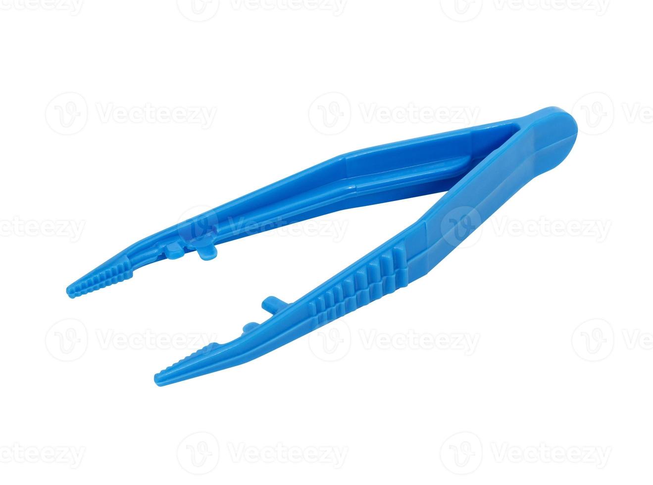 blue plastic forceps isolated on white background with clipping path photo