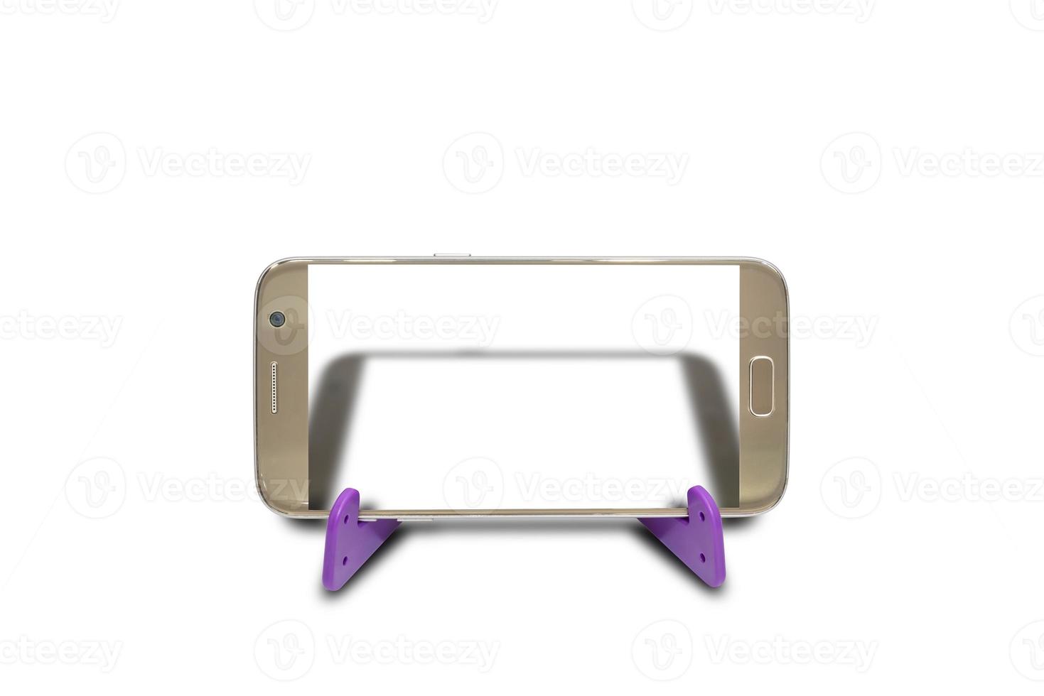 Golden mobile phone on tripod isolated on white background,clipping path photo