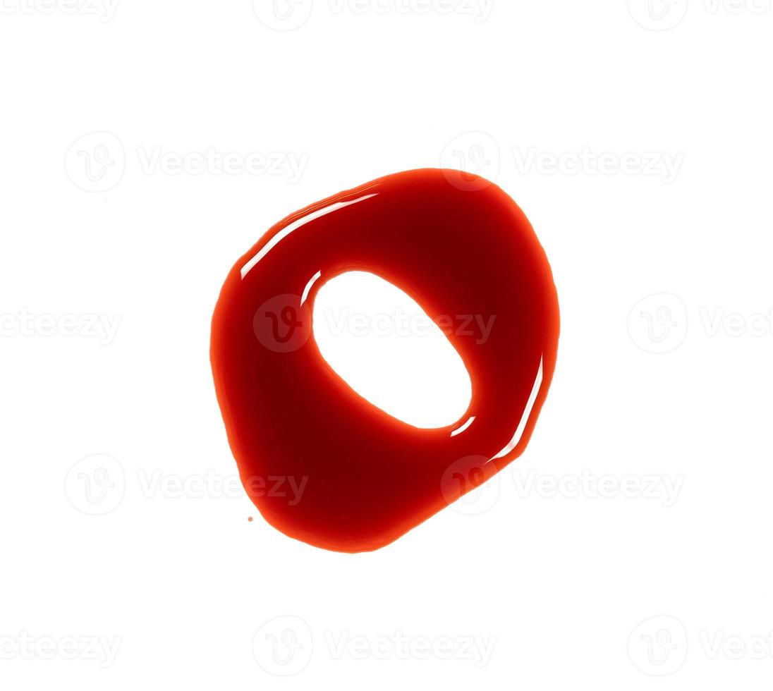 closeup drops of red blood isolated on white background,abstract pattern photo