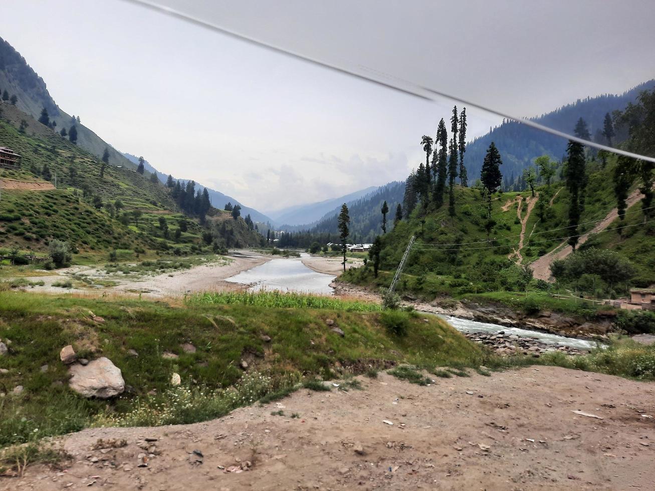 Kashmir is the most beautiful region in the world which is famous for its green valleys, beautiful trees, high mountains and flowing springs. photo