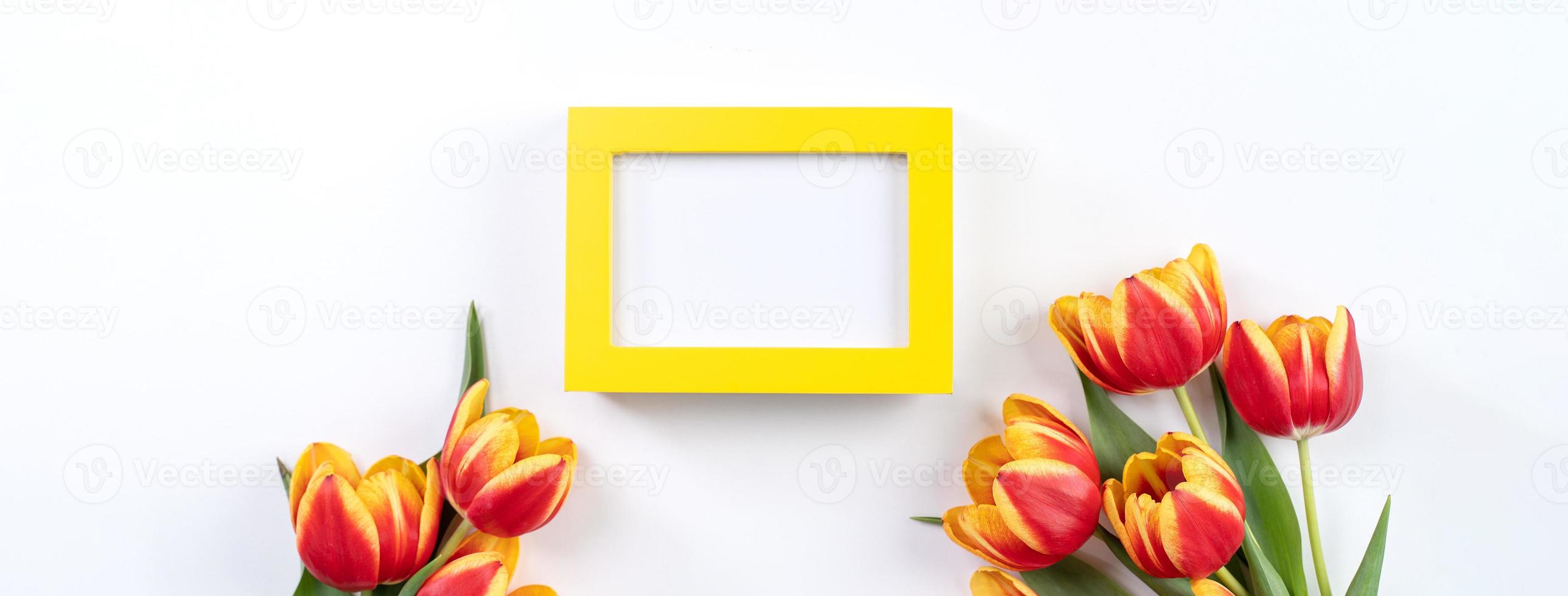 Mother's Day Design Concept, Tulip flower bunch - Beautiful Red, yellow bouquet isolated on white background table, top view, flat lay, copy space photo