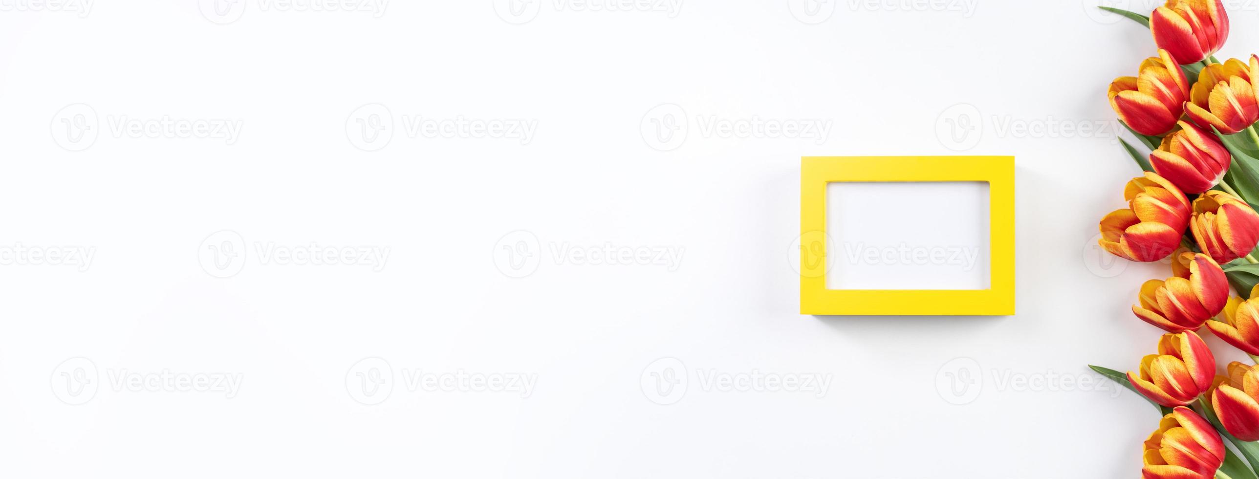 Mother's Day Design Concept, Tulip flower bunch - Beautiful Red, yellow bouquet isolated on white background table, top view, flat lay, copy space photo