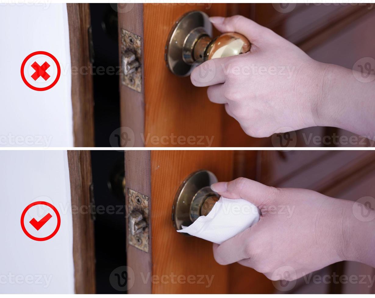 Young Asian woman adult opening door with clean tissue on the knob handle instead of hand, concept of antibacterial, virus prevention, close up. photo