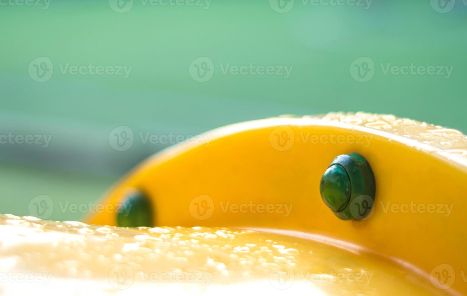 Raindrop on plastic tunnel toy after the morning rain photo