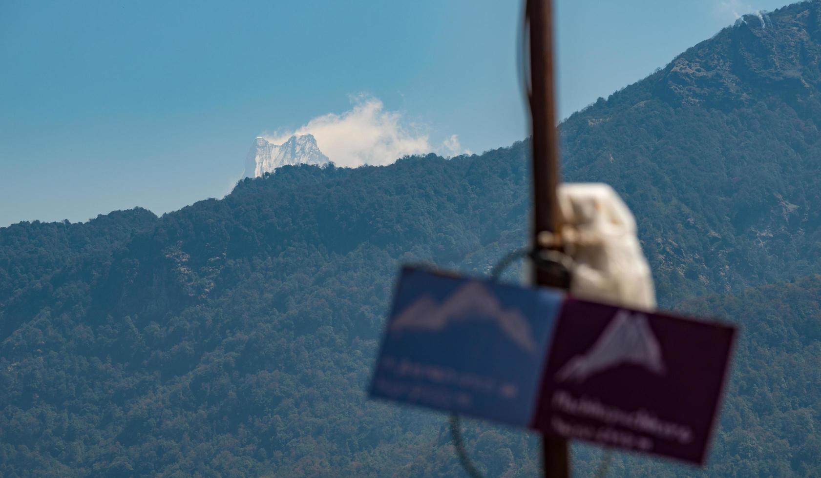 The peak of Machapuchare mountain or Mount Fish tail the holy mountain in Himalaya mountains range of Nepal. photo