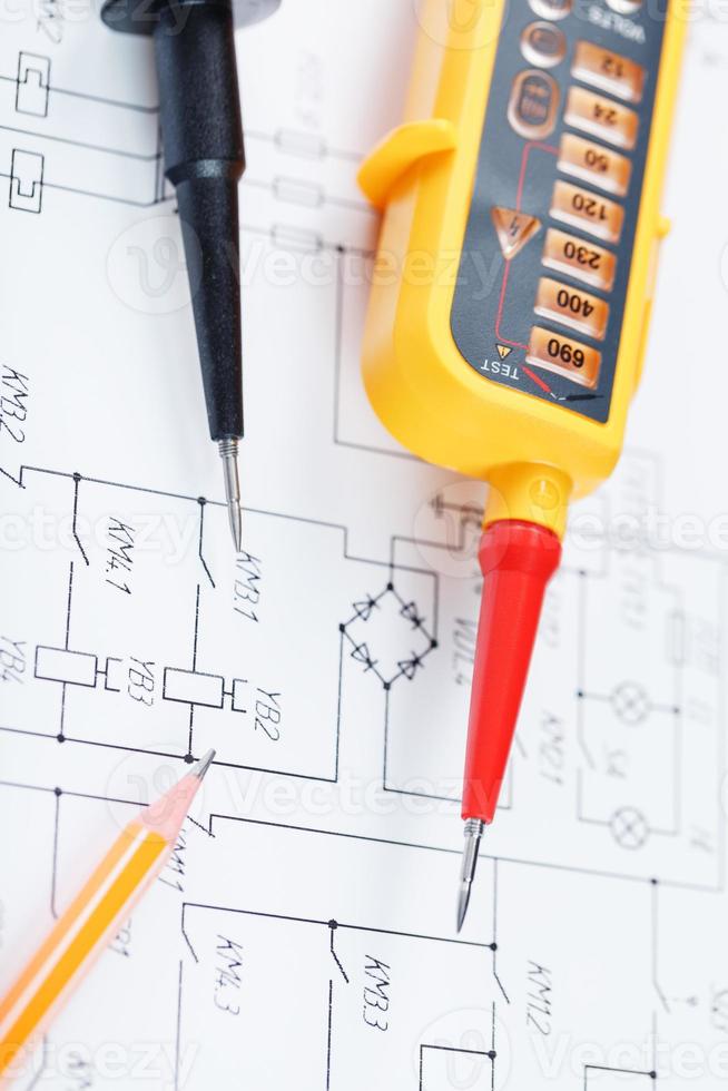 Yellow voltage indicator in close-up on the electrical diagram photo