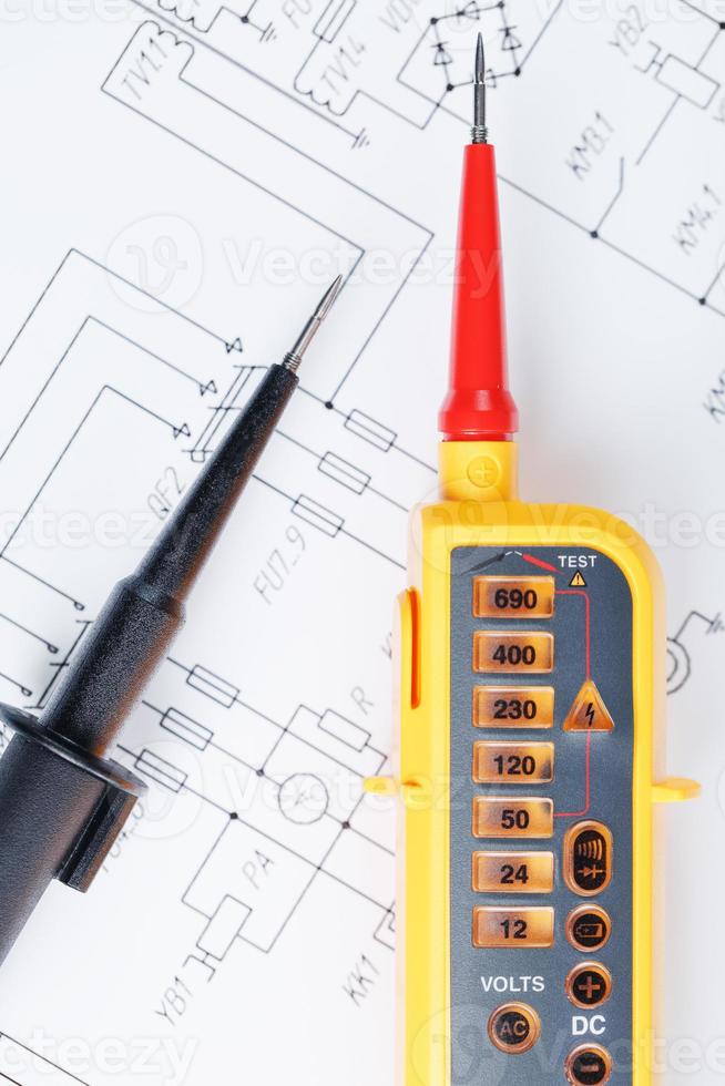 Yellow voltage indicator in close-up on the electrical diagram photo