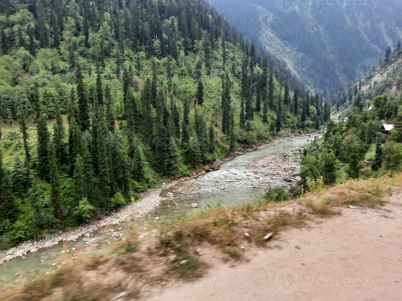 Kashmir is the most beautiful region in the world which is famous for its green valleys, beautiful trees, high mountains and flowing springs. photo