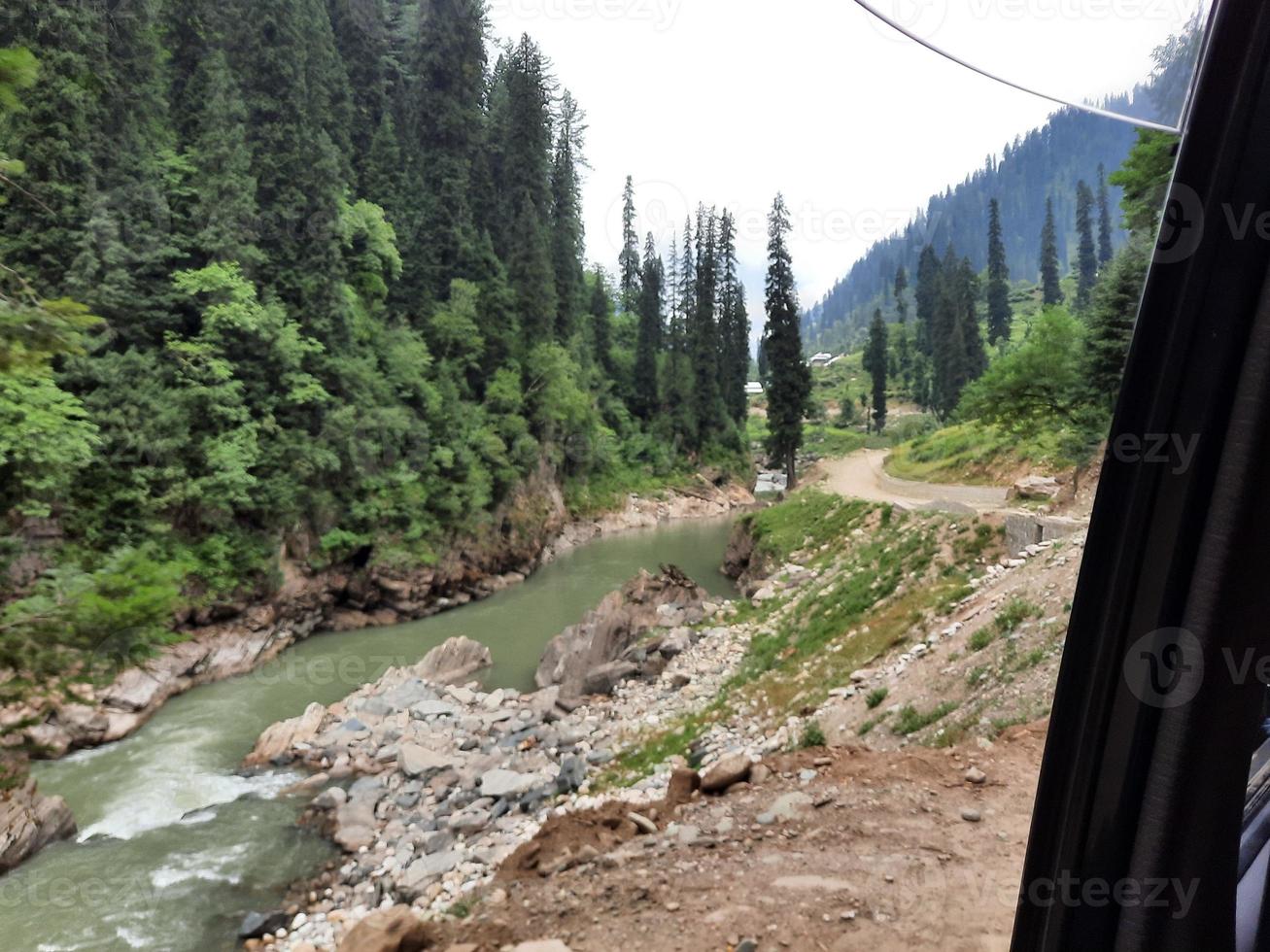 Kashmir is the most beautiful region in the world which is famous for its green valleys, beautiful trees, high mountains and flowing springs. photo